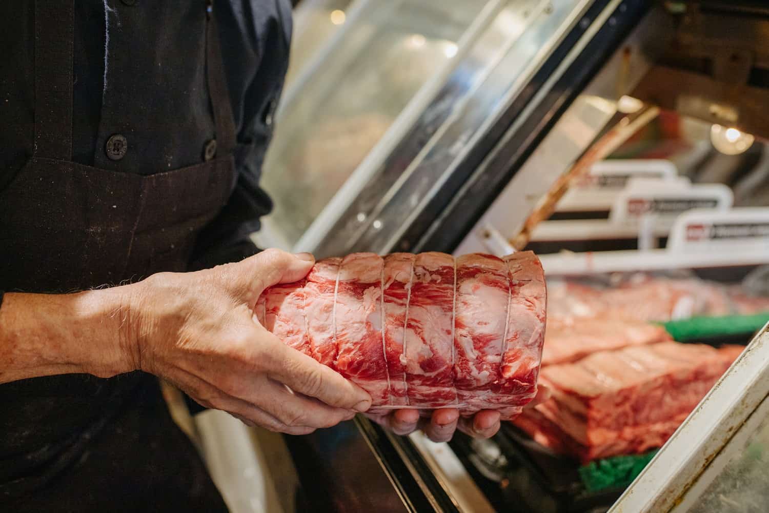 Meat being put in fridge