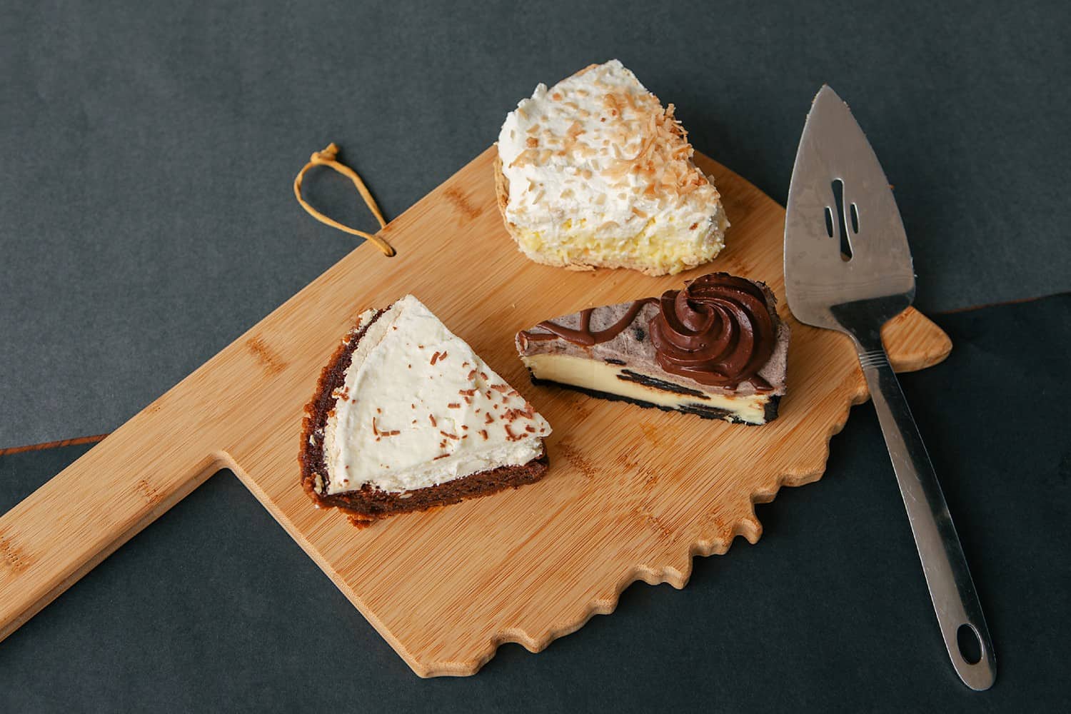 Oklahoma shaped serving board and 3 pie slices